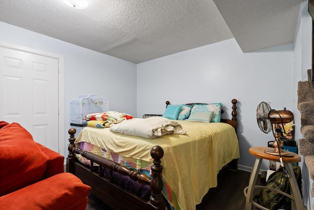 1433 Stratton Place Dr, Chattanooga, TN 37421 - bedroom featuring wood finished floors and a textured ceiling