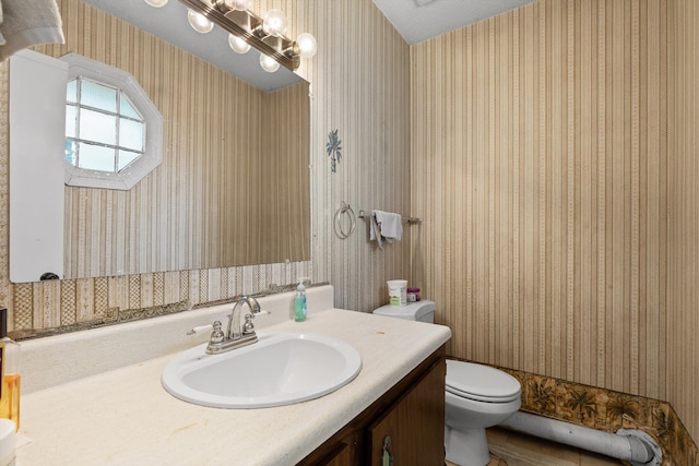 1433 Stratton Place Dr, Chattanooga, TN 37421 - bathroom with wallpapered walls and vanity