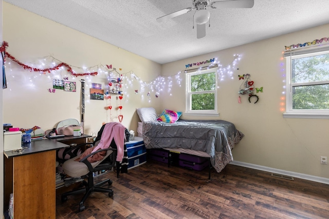 1433 Stratton Place Dr, Chattanooga, TN 37421 - bedroom featuring wood finished floors, a textured ceiling, and a ceiling fan