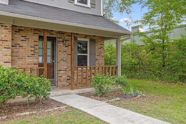 1433 Stratton Place Dr, Chattanooga, TN 37421 - property entrance with a porch, brick siding, and roof with shingles