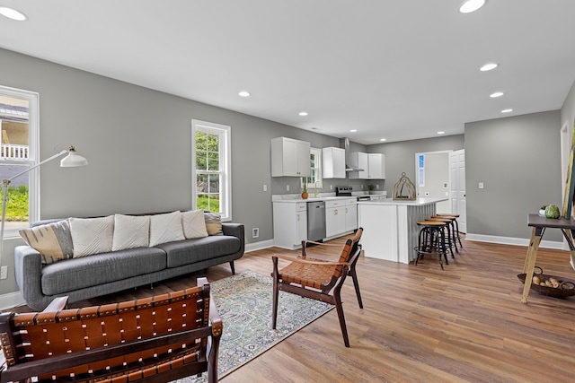 2001 Vine St, Chattanooga, TN 37404 - living area featuring light wood-style floors and recessed lighting