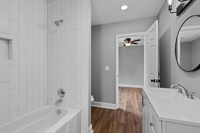 2001 Vine St, Chattanooga, TN 37404 - bathroom with vanity, a ceiling fan, wood finished floors, washtub / shower combination, and recessed lighting