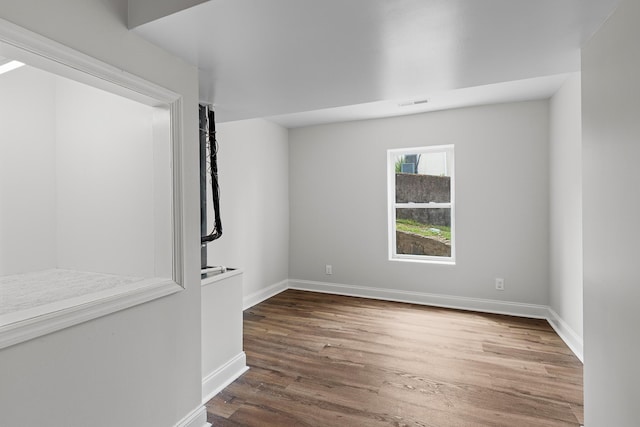 2001 Vine St, Chattanooga, TN 37404 - unfurnished room featuring wood finished floors and baseboards