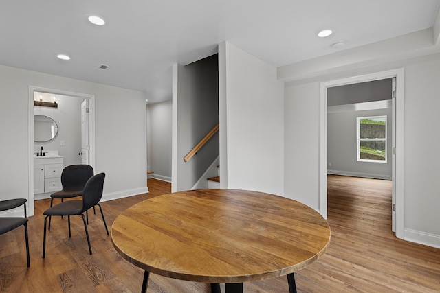 2001 Vine St, Chattanooga, TN 37404 - dining area featuring light wood-style flooring, recessed lighting, and stairway