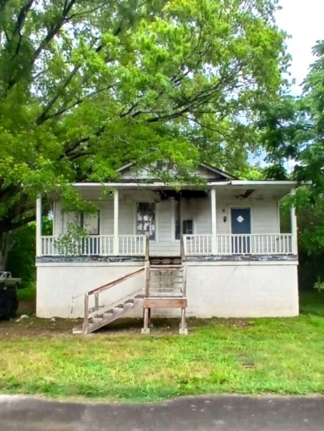 207 W 9th St, Chickamauga, GA 30707 - view of front of property with covered porch and stairway