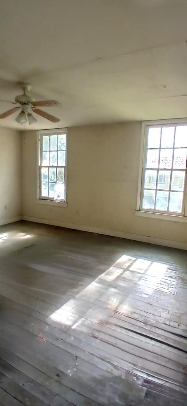207 W 9th St, Chickamauga, GA 30707 - spare room with a ceiling fan and baseboards