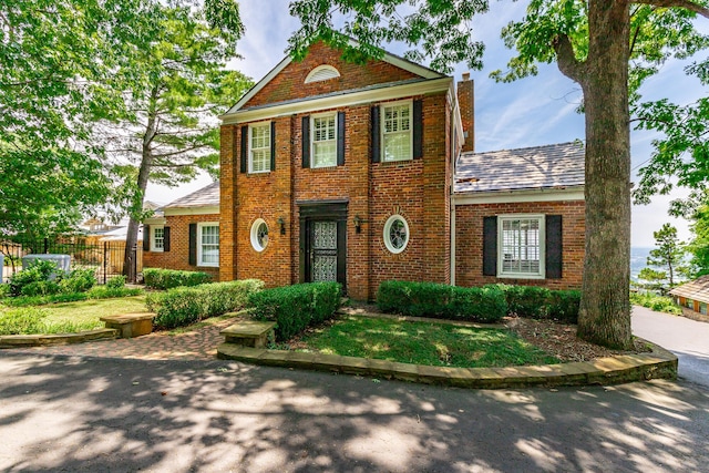 208 S Palisades Dr, Signal Mountain, TN 37377 - colonial-style house with brick siding and a chimney