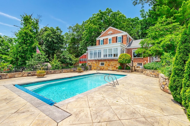 208 S Palisades Dr, Signal Mountain, TN 37377 - view of swimming pool featuring a patio and view of wooded area