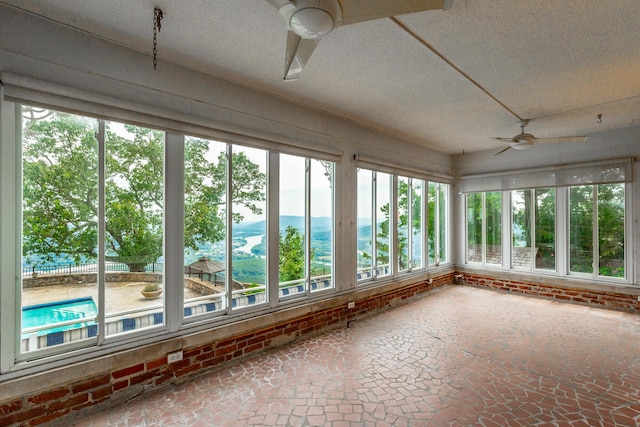 208 S Palisades Dr, Signal Mountain, TN 37377 - unfurnished sunroom featuring a textured ceiling