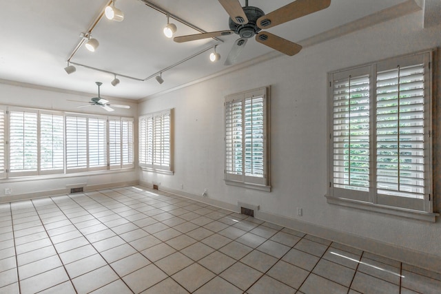 208 S Palisades Dr, Signal Mountain, TN 37377 - empty room featuring ceiling fan, tile patterned flooring, healthy amount of natural light, and ornamental molding