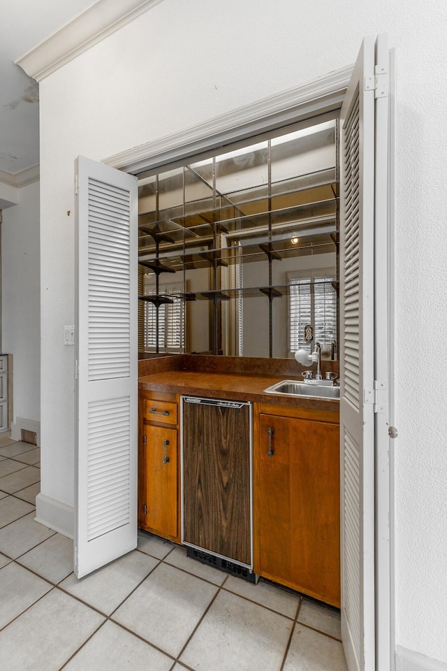 208 S Palisades Dr, Signal Mountain, TN 37377 - bar area with light tile patterned floors and ornamental molding