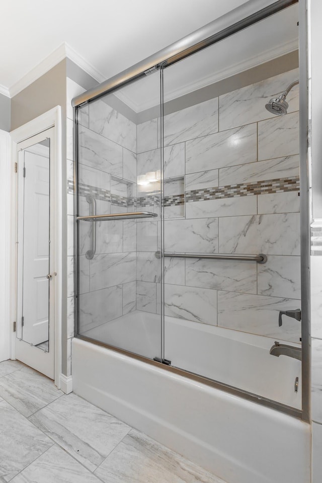 208 S Palisades Dr, Signal Mountain, TN 37377 - bathroom with combined bath / shower with glass door, ornamental molding, and marble look tiles