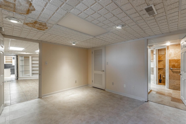 208 S Palisades Dr, Signal Mountain, TN 37377 - tiled empty room featuring baseboards and built in features