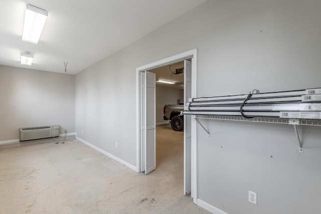 208 S Palisades Dr, Signal Mountain, TN 37377 - unfurnished bedroom with a wall unit AC and concrete floors