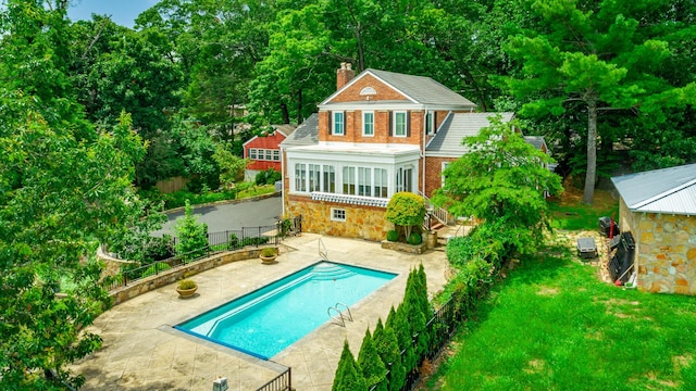208 S Palisades Dr, Signal Mountain, TN 37377 - rear view of house featuring a chimney, a fenced backyard, stone siding, and a patio area