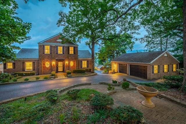 208 S Palisades Dr, Signal Mountain, TN 37377 - view of front of house featuring brick siding and curved driveway