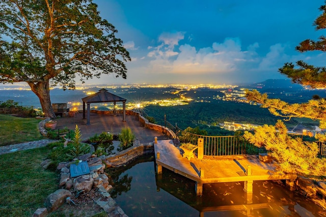 208 S Palisades Dr, Signal Mountain, TN 37377 - patio terrace at dusk featuring a gazebo