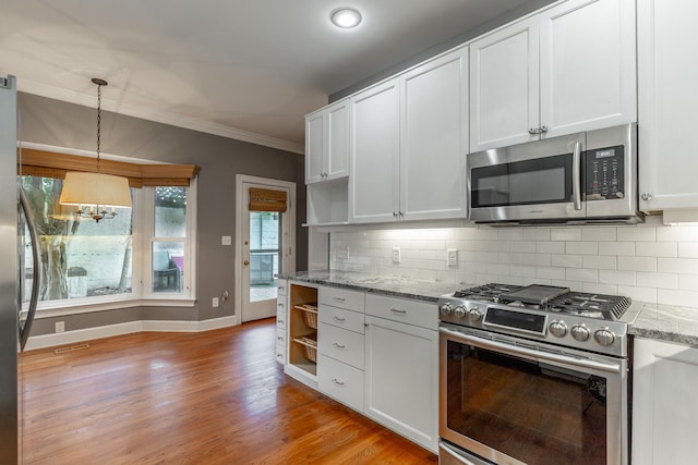 802 Signal Mountain Blvd Unit 121, Signal Mountain, TN 37377 - kitchen with open shelves, appliances with stainless steel finishes, crown molding, backsplash, and white cabinetry