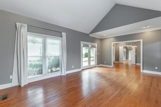 802 Signal Mountain Blvd Unit 121, Signal Mountain, TN 37377 - unfurnished room featuring healthy amount of natural light, a chandelier, high vaulted ceiling, light wood-type flooring, and crown molding