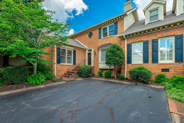 802 Signal Mountain Blvd Unit 121, Signal Mountain, TN 37377 - view of front of property with a chimney, brick siding, and a shingled roof
