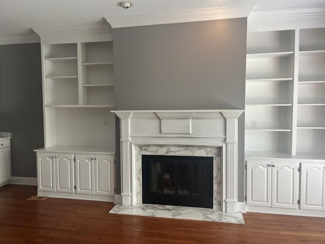 802 Signal Mountain Blvd Unit 121, Signal Mountain, TN 37377 - unfurnished living room featuring crown molding, dark wood-style floors, and a premium fireplace