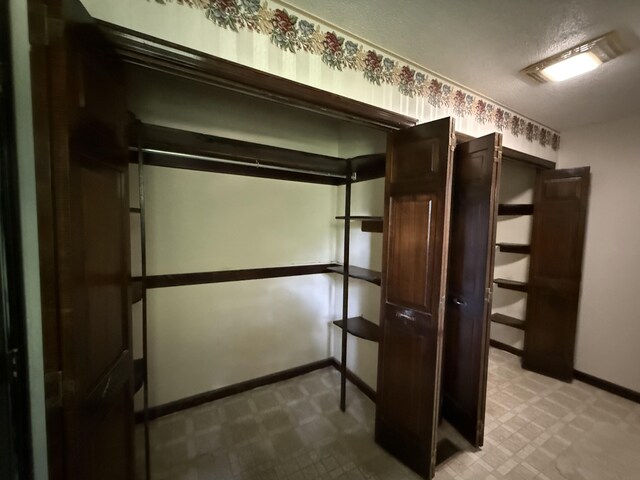30551 Al Al Unit 71, Bryant, AL 35958 - unfurnished bedroom featuring baseboards and tile patterned floors