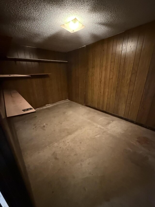 30551 Al Al Unit 71, Bryant, AL 35958 - finished basement with wooden walls and a textured ceiling