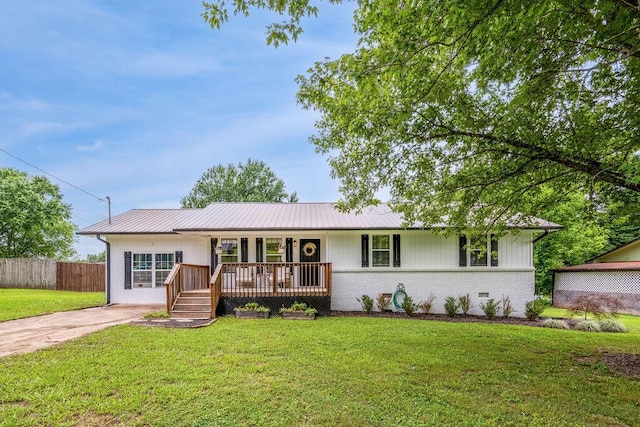 414 N Three Notch Rd, Ringgold, GA 30736 - ranch-style home with a porch, a metal roof, and brick siding
