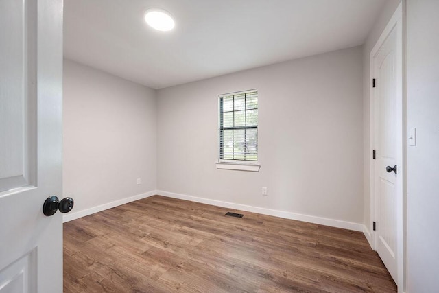 414 N Three Notch Rd, Ringgold, GA 30736 - empty room featuring wood finished floors and baseboards