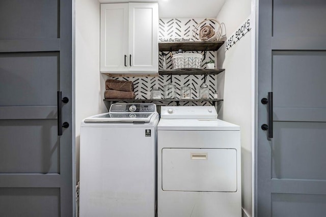 414 N Three Notch Rd, Ringgold, GA 30736 - washroom with cabinet space and washer and clothes dryer