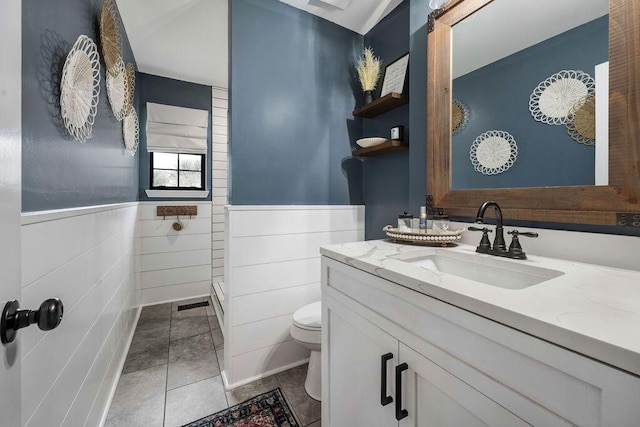 414 N Three Notch Rd, Ringgold, GA 30736 - bathroom featuring vanity, wainscoting, tile walls, and a shower