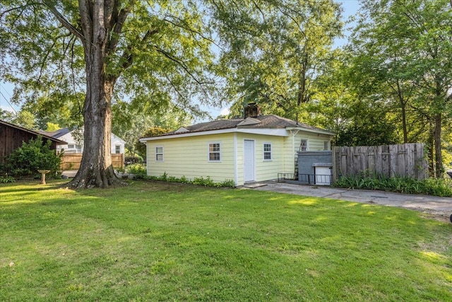 147 Kirby St, Summerville, GA 30747 - rear view of property with a chimney