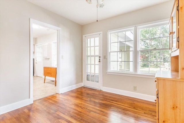 147 Kirby St, Summerville, GA 30747 - doorway with wood finished floors and healthy amount of natural light
