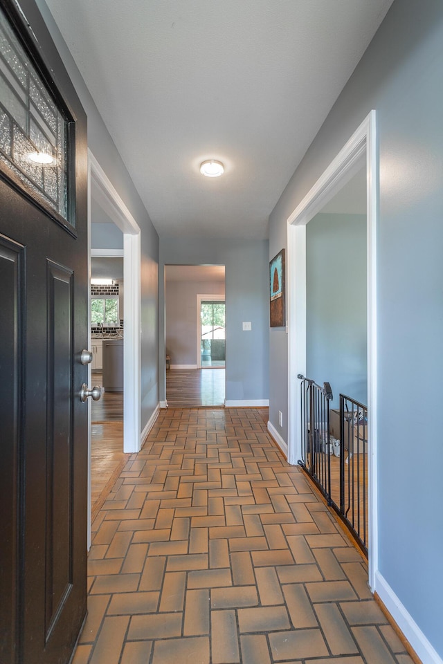 409 Caraway Turn, Chattanooga, TN 37415 - corridor with baseboards and brick patterned flooring