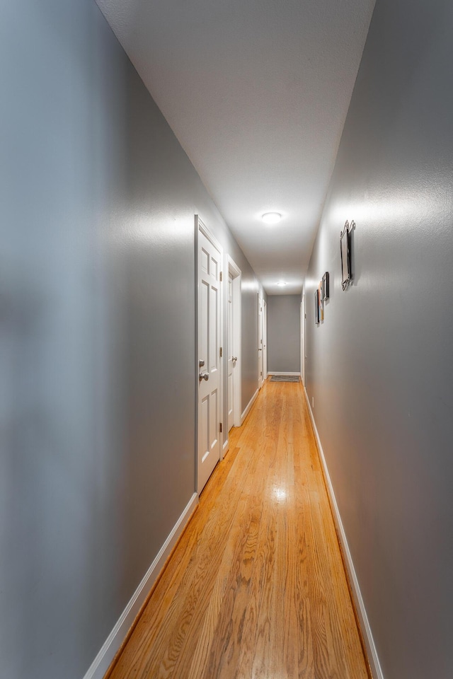 409 Caraway Turn, Chattanooga, TN 37415 - hallway featuring light wood-style flooring and baseboards