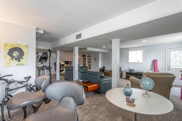409 Caraway Turn, Chattanooga, TN 37415 - carpeted living room featuring a textured ceiling