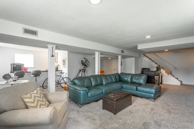 409 Caraway Turn, Chattanooga, TN 37415 - living area with carpet, stairway, a textured ceiling, and recessed lighting