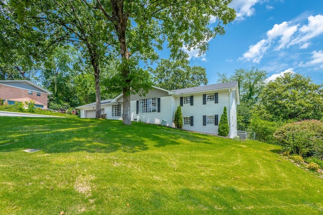 409 Caraway Turn, Chattanooga, TN 37415 - view of front of home with an attached garage and a front lawn