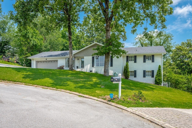409 Caraway Turn, Chattanooga, TN 37415 - ranch-style house featuring a front yard and an attached garage