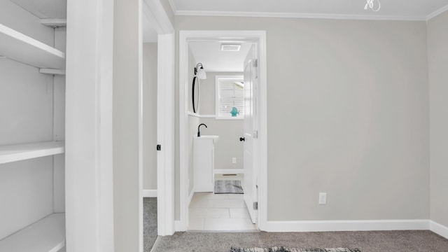 1514 Prigmore Rd, Chattanooga, TN 37412 - hallway with carpet flooring, tile patterned floors, and ornamental molding