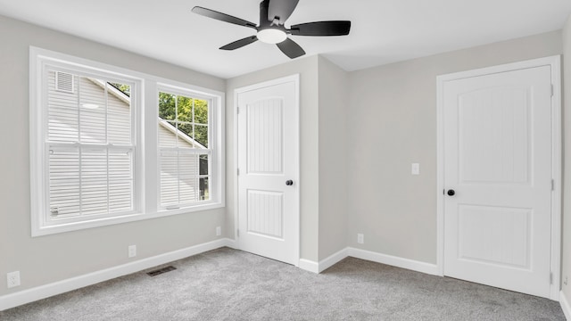 1514 Prigmore Rd, Chattanooga, TN 37412 - unfurnished bedroom featuring carpet, a ceiling fan, and a closet