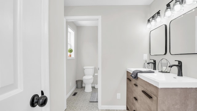 1514 Prigmore Rd, Chattanooga, TN 37412 - bathroom featuring baseboards and vanity
