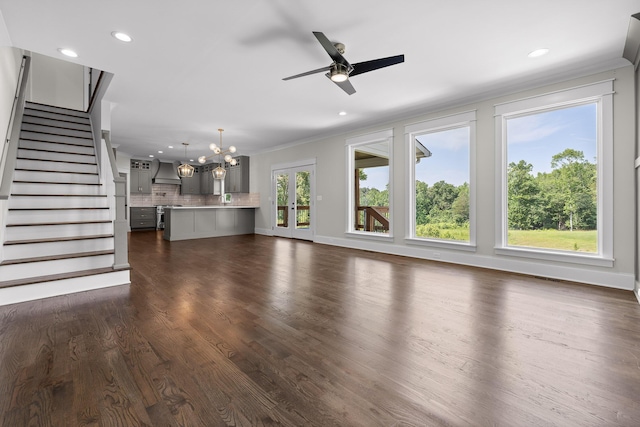 1784 River Breeze Dr, Soddy Daisy, TN 37379 - unfurnished living room with ornamental molding, dark wood-style flooring, a ceiling fan, stairs, and recessed lighting