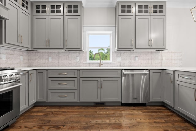 1784 River Breeze Dr, Soddy Daisy, TN 37379 - kitchen featuring appliances with stainless steel finishes, gray cabinets, light countertops, backsplash, and glass insert cabinets