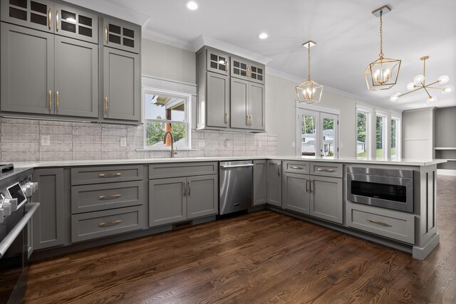 1784 River Breeze Dr, Soddy Daisy, TN 37379 - kitchen with gray cabinetry, dishwasher, a chandelier, a peninsula, and ornamental molding