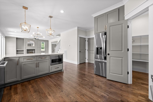1784 River Breeze Dr, Soddy Daisy, TN 37379 - kitchen with gray cabinetry, stainless steel refrigerator with ice dispenser, a chandelier, dark wood-type flooring, and ornamental molding