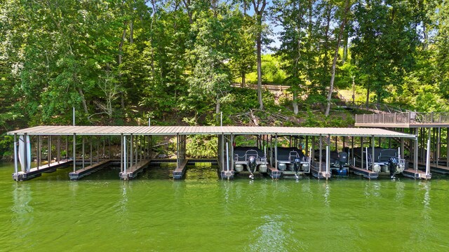 1784 River Breeze Dr, Soddy Daisy, TN 37379 - dock with boat lift, a water view, and view of scattered trees