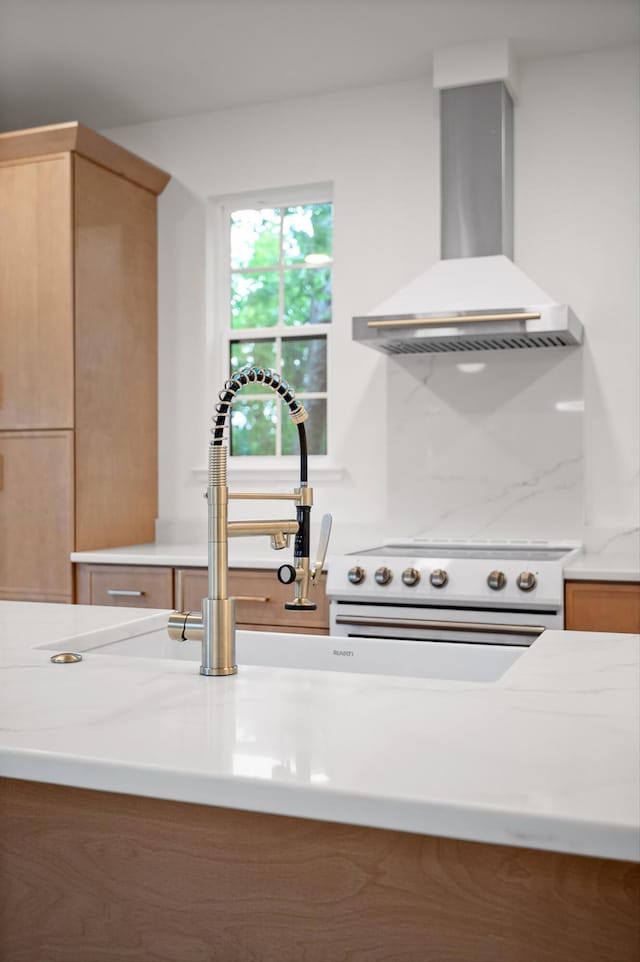 4206 Oakland Ter N, Red Bank, TN 37415 - kitchen with wall chimney exhaust hood, light countertops, range, and light brown cabinets