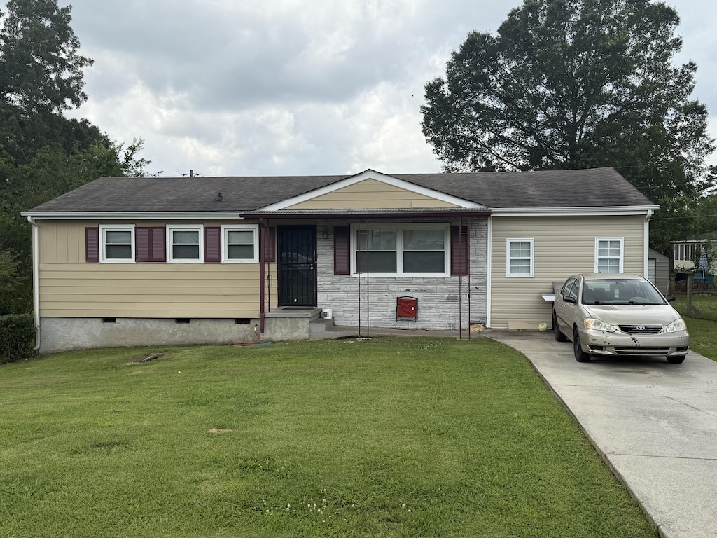 5504 Kenyon Rd, Chattanooga, TN 37416 - ranch-style home with a front lawn, crawl space, concrete driveway, and a shingled roof