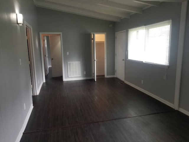 5007 Jarrett Rd, Chattanooga, TN 37416 - unfurnished bedroom featuring dark wood-type flooring